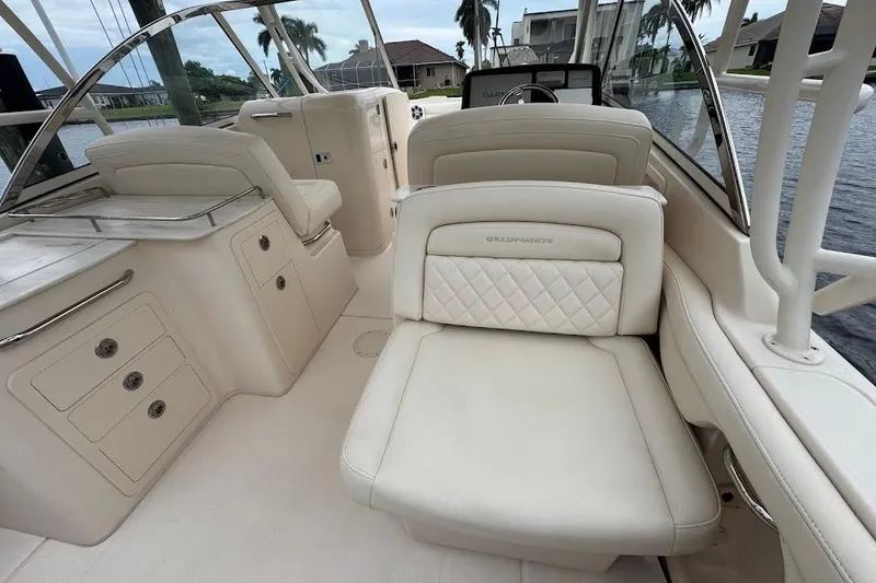 Slide: The Image of 2020 Grady-White Freedom 285 boat interior with luxurious seating and storage compartments. - 24