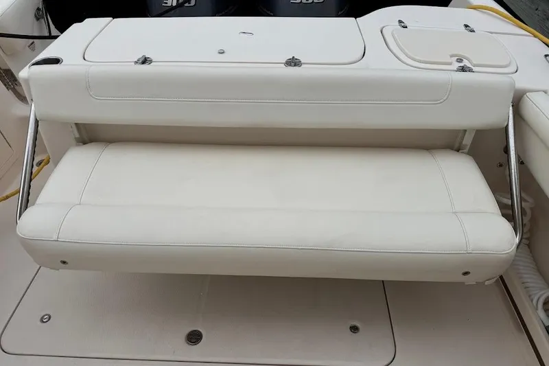 Slide: The Image of 2020 Grady-White Freedom 285 boat with white cushioned seating. - 41