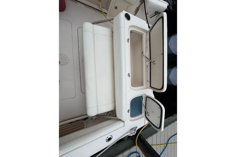 Slide: The Image of 2020 Grady-White Freedom 285 boat interior with open storage compartments. - 44