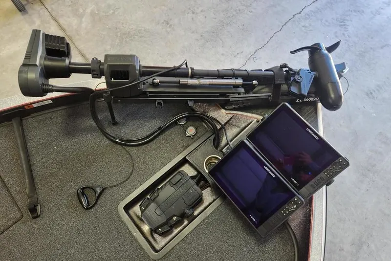 Slide: The Image of 2021 Ranger Z520C boat with trolling motor and dual Lowrance fish finders. - 3