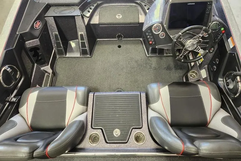Slide: The Image of 2021 Ranger Z520C Ranger Cup boat interior with dual seats and advanced dashboard controls. - 7