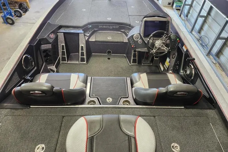 Slide: The Image of 2021 Ranger Z520C Ranger Cup Equipped boat interior with dual seats and advanced dashboard. - 9