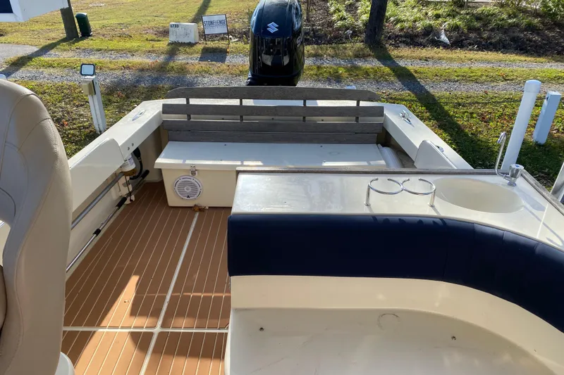 Slide: The Image of 2023 Seaway 24 Seafarer boat on calm water, front view. - 7