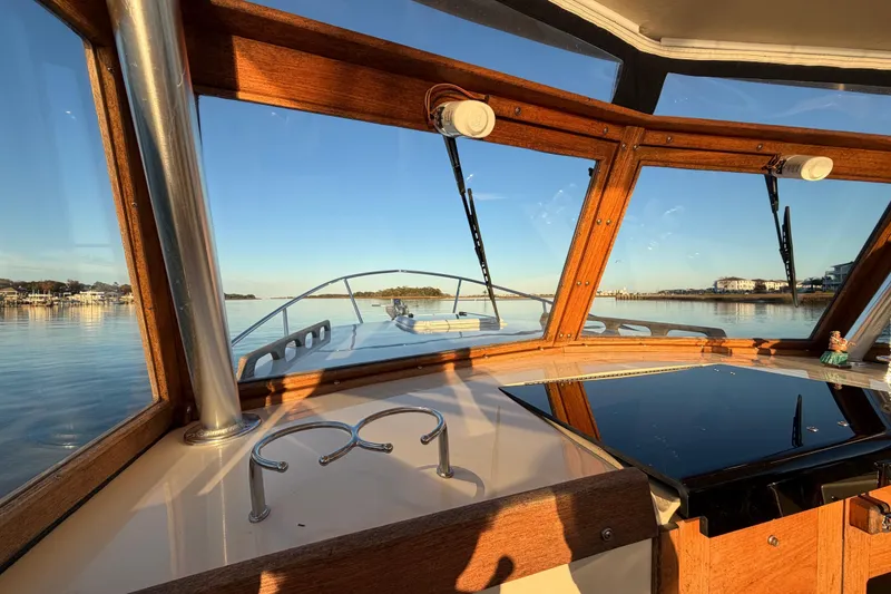 Slide: The Image of Interior view of 2023 Seaway 24 Seafarer boat with scenic waterway. - 9
