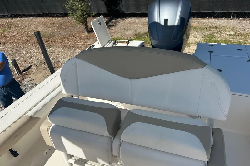 Slide: The Image of 2020 Robalo 246 Cayman boat seating and engine view. - 8