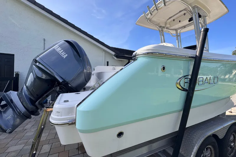 Slide: The Image of 2022 Robalo R230 Center Console boat with Yamaha engine on trailer. - 11
