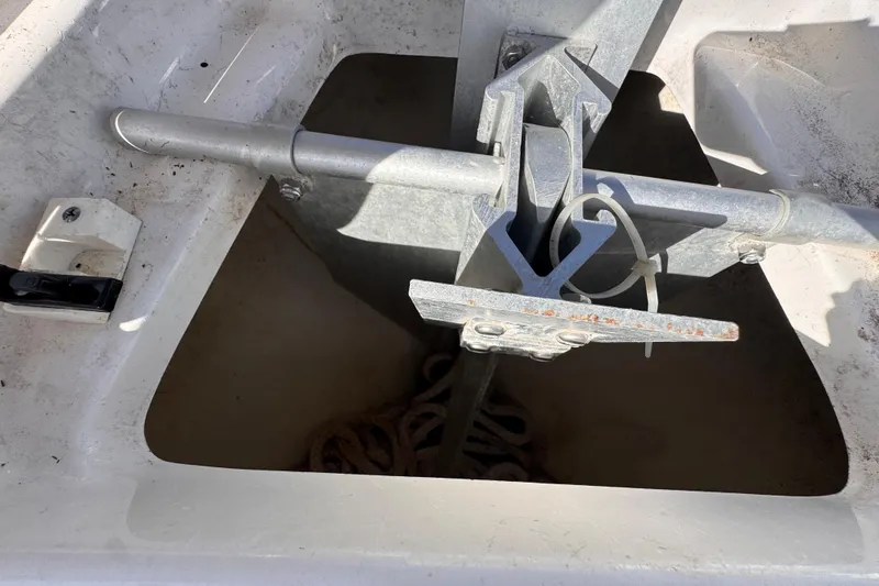 Slide: The Image of Anchor compartment of 2022 Robalo R230 Center Console boat. - 25