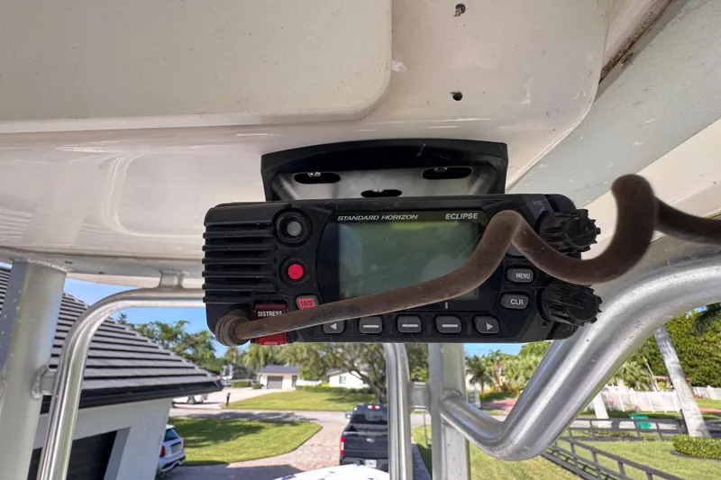 Slide: The Image of Radio equipment on 2022 Robalo R230 Center Console boat, mounted under canopy. - 40