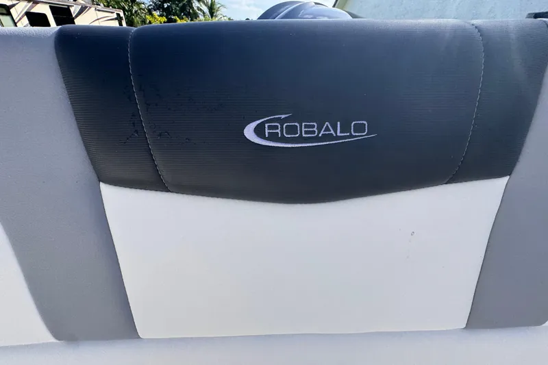 Slide: The Image of 2022 Robalo R230 Center Console boat seat with logo detail. - 58