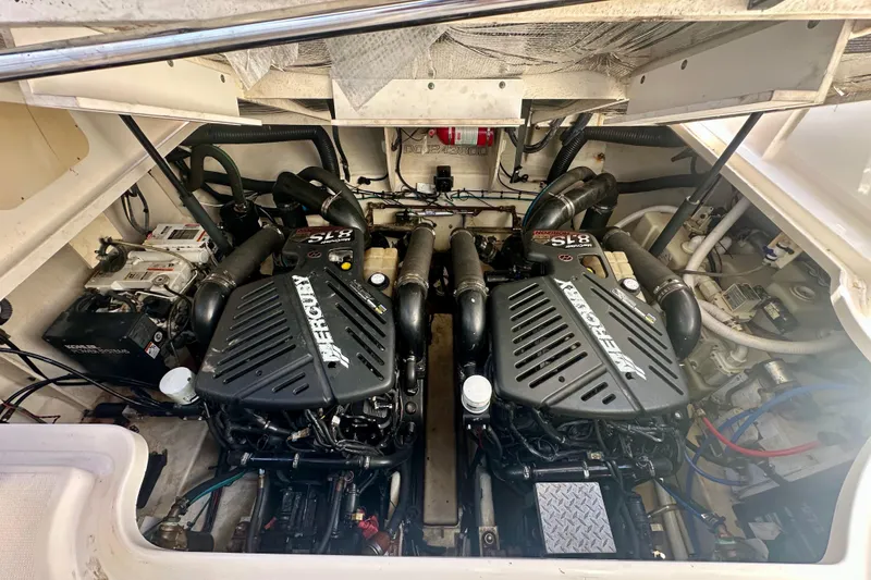 Slide: The Image of Engine compartment of a 2008 Sea Ray 340 Sundancer with twin MerCruiser engines. - 15