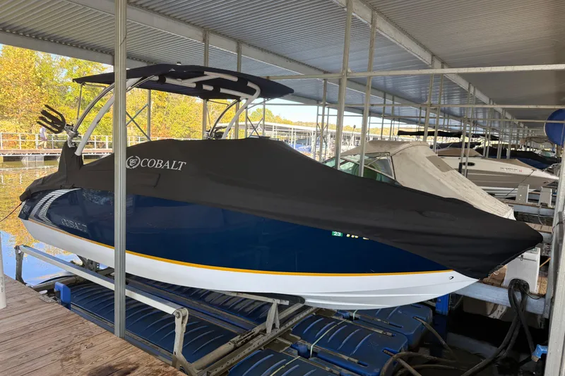 The Image of 2018 Cobalt R3 Surf boat covered in a marina dock. - 1