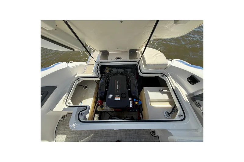 Slide: The Image of Open engine compartment of 2018 Cobalt R3 Surf boat, showcasing engine details. - 18