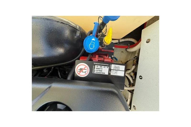 Slide: The Image of Engine compartment of a 2018 Cobalt R3 Surf boat with Volvo Penta components. - 3