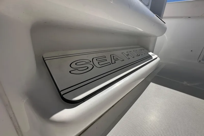 Slide: The Image of 2024 Sea Hunt Ultra 219 boat interior detail with logo. - 67
