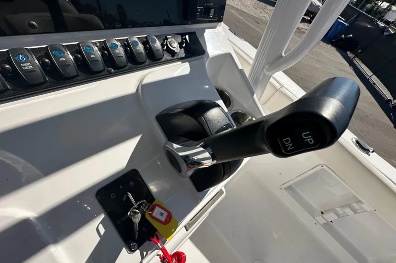 Slide: The Image of 2024 Sea Hunt Ultra 219 boat controls and dashboard close-up. - 72