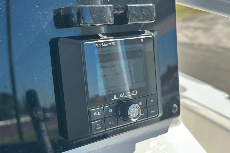 Slide: The Image of JL Audio MediaMaster 50 on 2024 Sea Hunt Ultra 219 boat dashboard. - 78