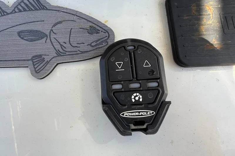 Slide: The Image of Remote control for Power-Pole anchor on Parker 2100 Special Edition boat, 2022 model. - 13