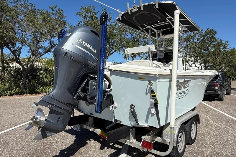 Slide: The Image of 2022 Parker 2100 Special Edition boat on trailer with Yamaha outboard motor. - 4