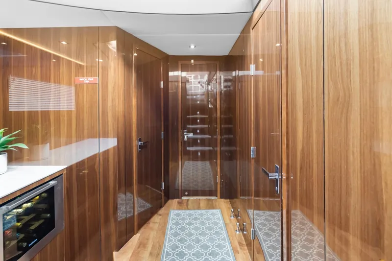 Slide: The Image of Luxurious interior of 2022 Cruisers Yachts 54 Cantius with wood paneling and modern design. - 34