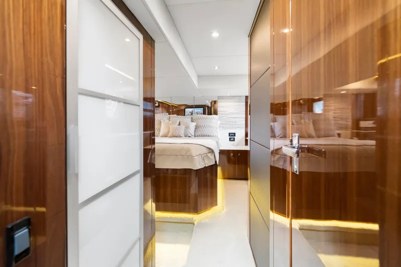 Slide: The Image of Luxurious interior of 2022 Cruisers Yachts 54 Cantius, featuring elegant wood finishes and modern design. - 39