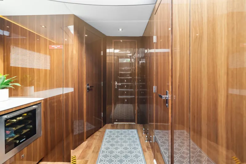 Slide: The Image of Luxurious interior of 2022 Cruisers Yachts 54 Cantius with wood paneling and modern amenities. - 63