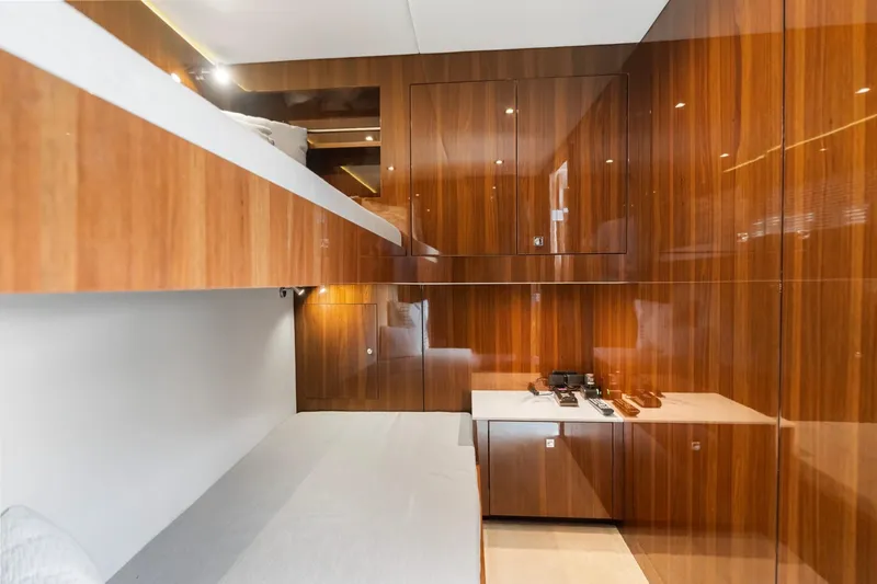 Slide: The Image of Luxurious interior of 2022 Cruisers Yachts 54 Cantius with sleek wood finishes. - 67