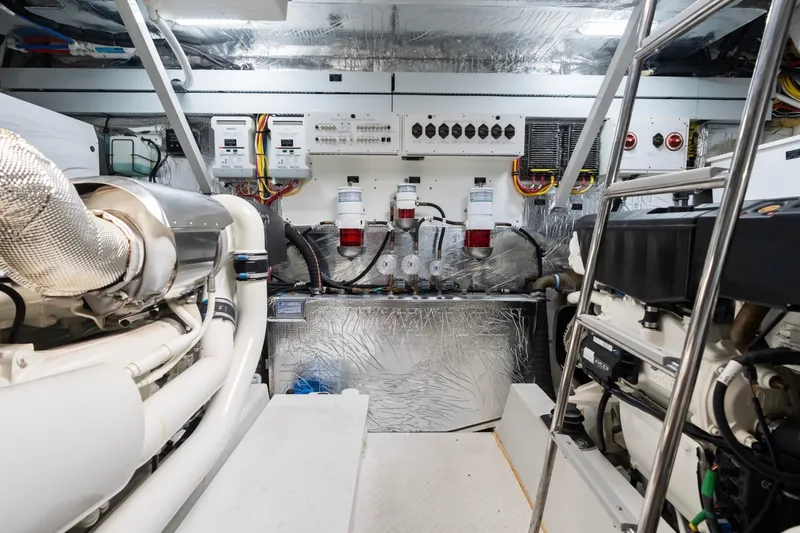 Slide: The Image of Engine room of 2022 Cruisers Yachts 54 Cantius, showcasing advanced machinery and equipment. - 68