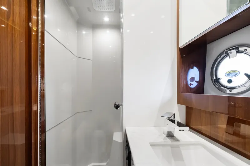 Slide: The Image of Luxurious bathroom interior of 2022 Cruisers Yachts 54 Cantius with modern fixtures. - 52