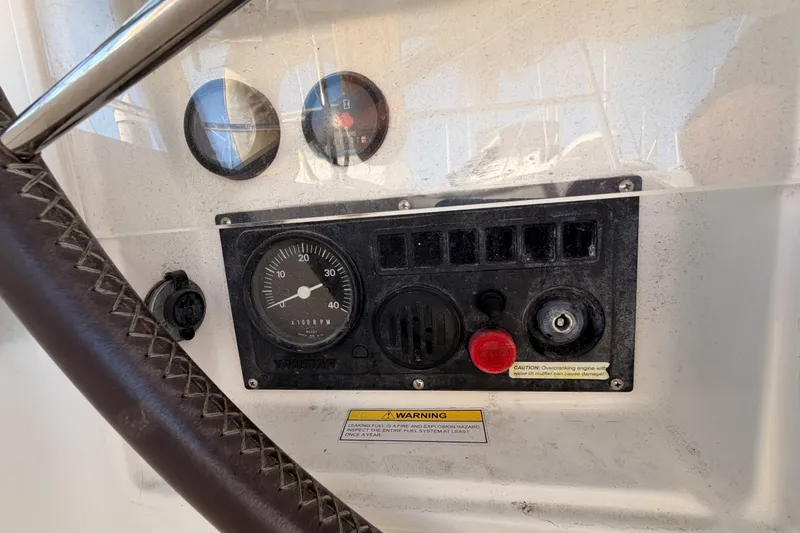 Slide: The Image of Control panel of 2003 Beneteau Oceanis Clipper 473 sailboat with gauges and warning label. - 10