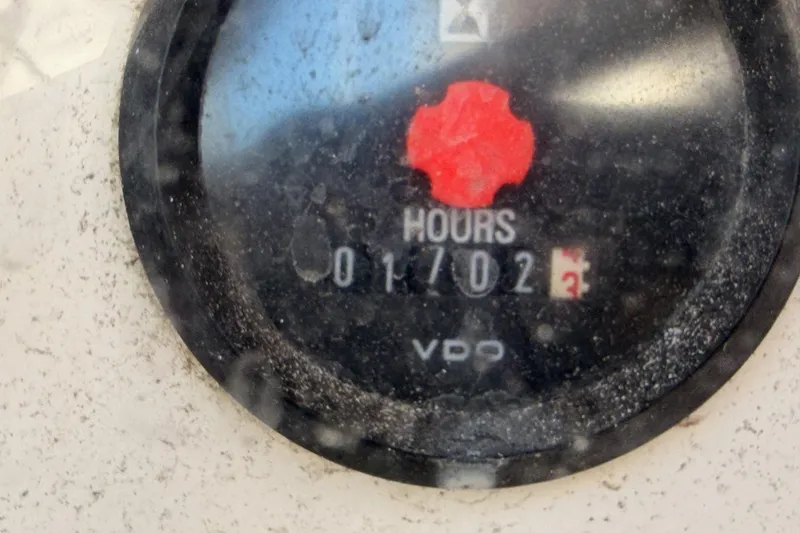 Slide: The Image of Hour meter on a 2003 Beneteau Oceanis Clipper 473, displaying 1102 hours. - 11