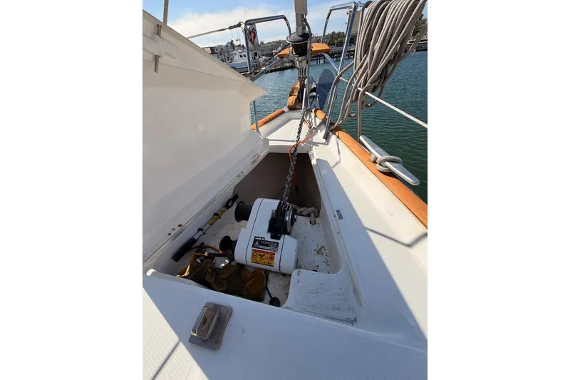 Slide: The Image of Beneteau Oceanis Clipper 473 sailboat anchor locker, 2003 model, with ropes and equipment. - 18