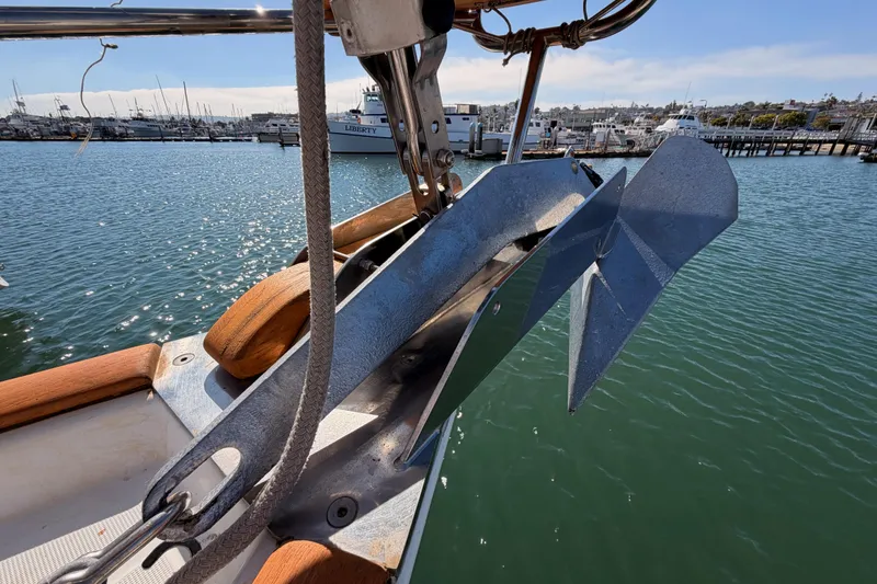 Slide: The Image of Anchor on 2003 Beneteau Oceanis Clipper 473 sailboat, docked in marina. - 21