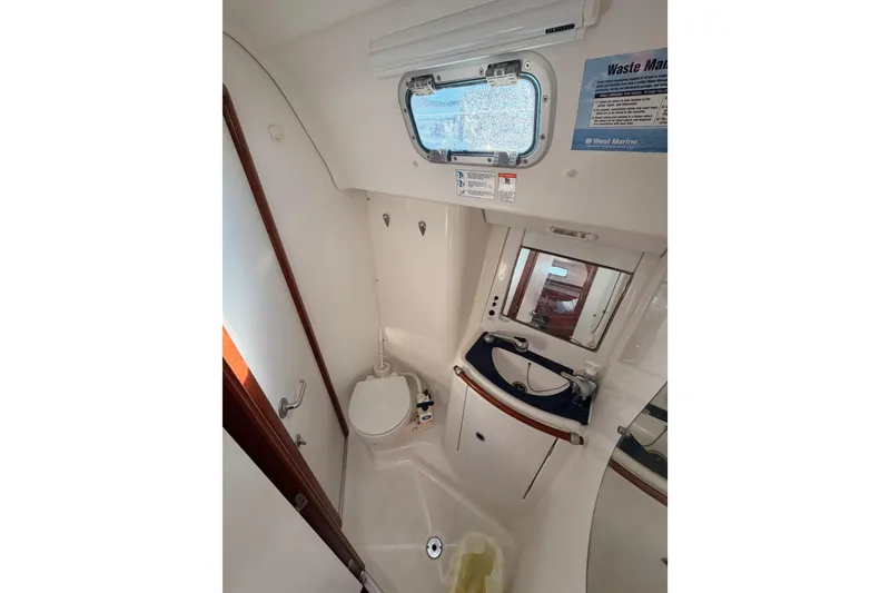 Slide: The Image of Bathroom interior of 2003 Beneteau Oceanis Clipper 473 yacht, featuring compact design. - 41