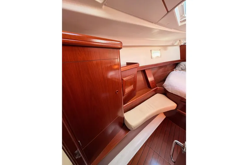 Slide: The Image of Luxurious wooden interior of 2003 Beneteau Oceanis Clipper 473 yacht cabin. - 55