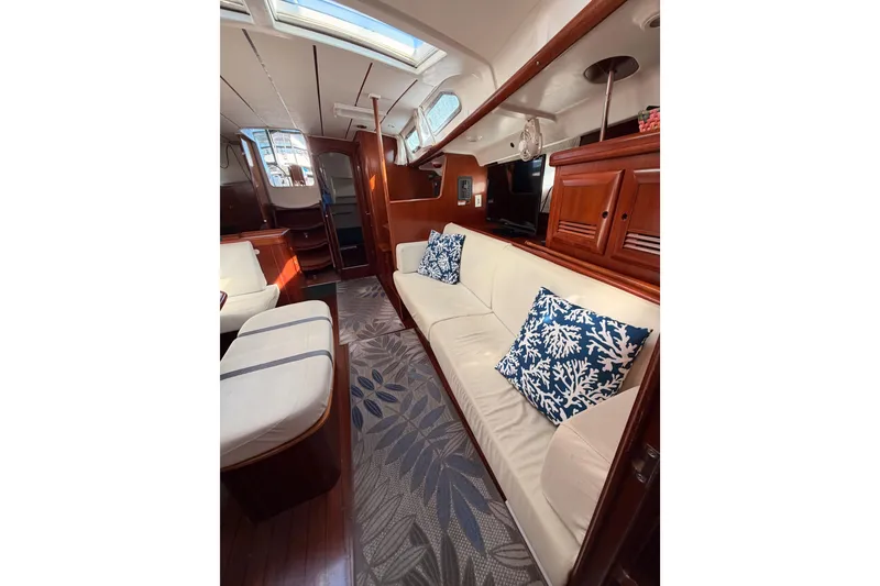 Slide: The Image of Luxurious interior of 2003 Beneteau Oceanis Clipper 473 yacht with elegant seating and decor. - 62