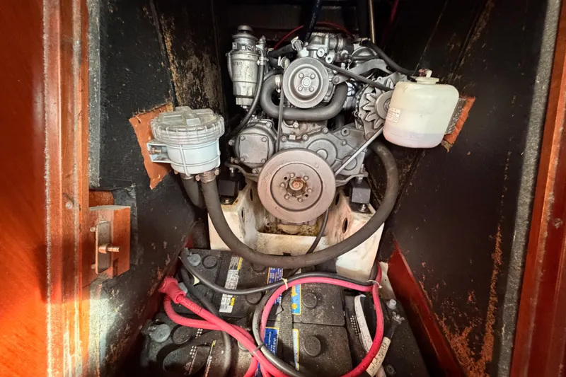 Slide: The Image of Engine compartment of a 2003 Beneteau Oceanis Clipper 473 sailboat, showing detailed components. - 65