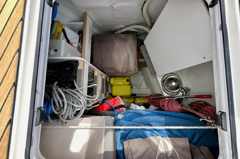 Slide: The Image of Interior of 2018 Jeanneau 54 yacht featuring compact bathroom and storage shelves. - 44