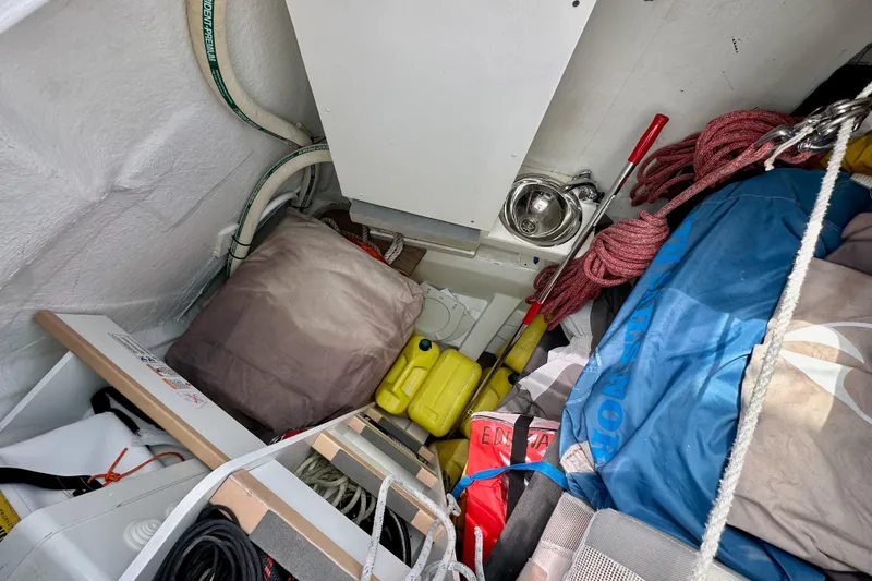 Slide: The Image of Interior of 2018 Jeanneau 54 yacht featuring compact bathroom and storage area. - 45