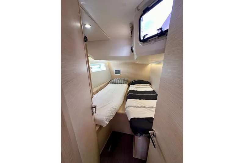 Slide: The Image of Interior of 2018 Jeanneau 54 yacht showing bathroom and living area with modern amenities. - 70