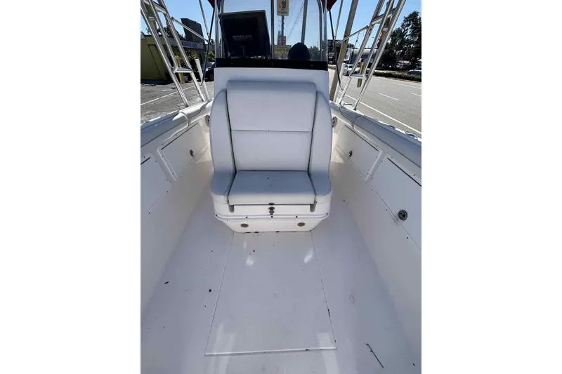 Slide: The Image of 1997 Wellcraft 302 Scarab boat storage compartment with open hatch. - 11