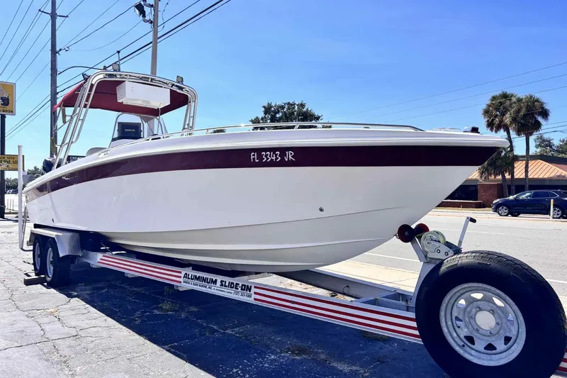 Slide: The Image of Interior view of a 1997 Wellcraft 302 Scarab boat cockpit with navigation equipment. - 2