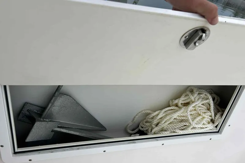 Slide: The Image of Anchor and rope storage on 1997 Wellcraft 302 Scarab boat. - 20