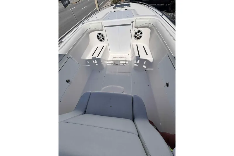 Slide: The Image of 1997 Wellcraft 302 Scarab boat on water, view from cockpit, overcast sky. - 8