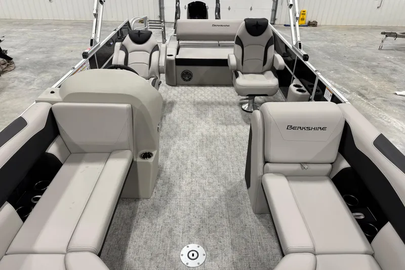 Slide: The Image of 2026 Berkshire 24 UL LE pontoon boat interior with luxurious seating and modern design. - 7