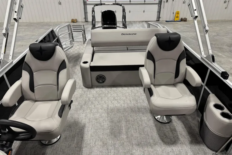 Slide: The Image of 2026 Berkshire 24 UL LE boat interior with plush seating and modern design. - 8