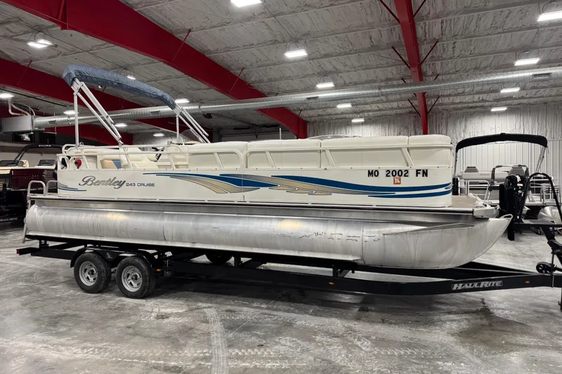 The Image of 2008 Bentley Pontoons 243 Cruise on trailer in indoor showroom. - 1