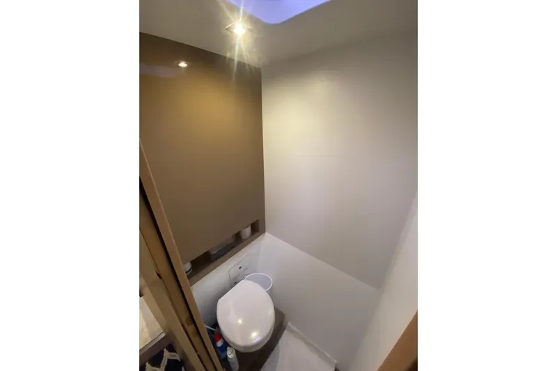 Slide: The Image of 2018 Fountaine Pajot Helia 44 Evolution yacht bathroom interior with modern fixtures. - 16