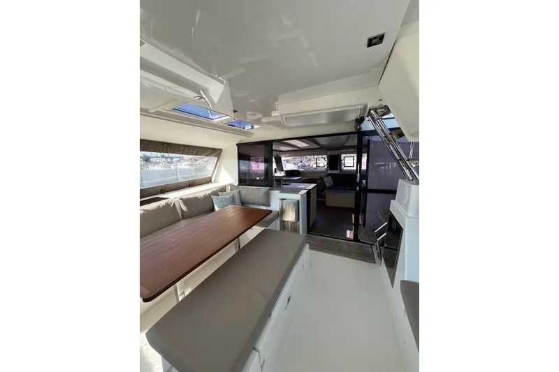 Slide: The Image of Interior of 2018 Fountaine Pajot Helia 44 Evolution catamaran, featuring spacious seating and modern design. - 21