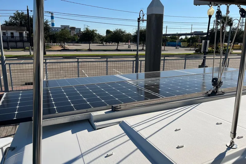 Slide: The Image of 2018 Fountaine Pajot Helia 44 Evolution catamaran docked at marina. - 3