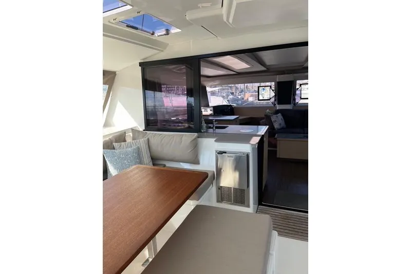 Slide: The Image of Interior of 2018 Fountaine Pajot Helia 44 Evolution catamaran, featuring a dining area and lounge. - 30